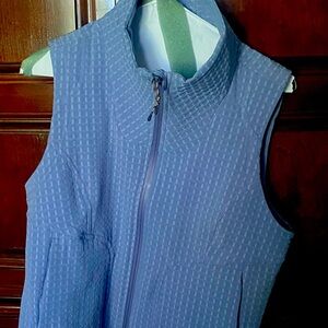 Lululemon purple light weight vest. Brand new, size 6.
